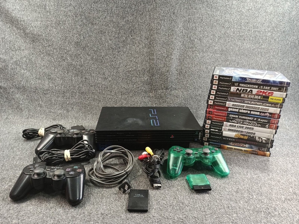 PlayStation 2 w/ 1 wireless controllers 2 wired controllers & 15 Game Lot
